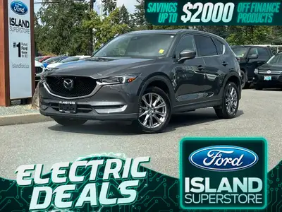 This 2021 Mazda CX-5 Signature has a Grey Exterior and Brown Interior with seating for 5. Equipped w...
