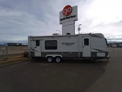 Single Slide Hideout Travel Trailer by Keystone RV w/Rear Kitchen Including Refrigerator, 3 Burner R...