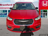Command attention with this 2024 Chrysler Pacifica Touring-L, boasting a stunning Red Hot Pearl Coat... (image 8)