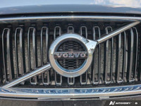 The 2021 Volvo XC60 T5 AWD Momentum is a sophisticated black SUV that offers an impeccable balance o... (image 9)
