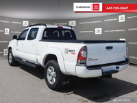 Check out this 2015 Toyota Tacoma 4WD Double Cab V6 Auto with 258,026 KMS, finished in a sleek White... (image 3)