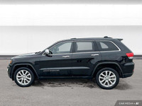 This Grand Cherokee features leather-trimmed, ventilated front seats, heated front and rear seats, p... (image 2)