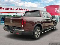 This 2019 Honda Ridgeline Touring Crew Cab Pickup boasts a powerful engine and a luxurious interior,... (image 5)
