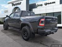 Look at this 2023 Ram 1500 TRX. Its Automatic transmission and Intercooled Supercharger Premium Unle... (image 2)
