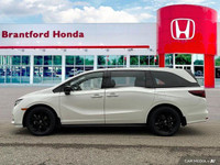 This 2023 Honda Odyssey Black Edition boasts a luxurious Platinum White Pearl exterior and a strikin... (image 1)
