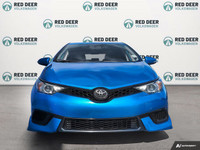 Experience the vibrant blue 2018 Toyota Corolla iM, a front-wheel-drive sedan designed for precision... (image 2)