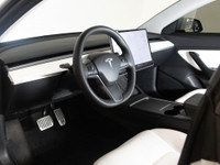This 2021 Tesla Model 3 Standard Range Plus offers cutting-edge electric performance, sleek styling,... (image 9)
