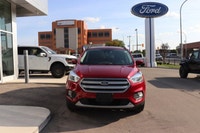 This Red Ford Escape SE is sleek, smart and more fun than ever! It has the best automatic highway fu... (image 1)