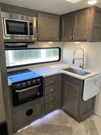 East to West Alta with bunkroom! This trailer features 2 slides, one in the main living area and ano... (image 9)