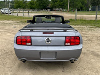 Turn heads and feel the power with this iconic 2007 Ford Mustang GT Convertible. This classic Americ... (image 4)
