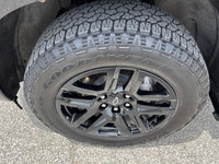 Meet the 2023 Chevrolet Silverado 1500 RST, a black 4x4 marvel that promises impressive handling and... (image 1)