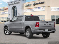 This Ram 1500 boasts a Gas/Electric V-6 3.6 L/220 engine powering this Automatic transmission. Cruis... (image 4)