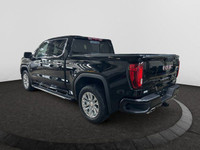 The All New GMC Sierra has been redefined from Hood to Hitch. This 4WD Black Sierra is a Crew Cab Pi... (image 2)