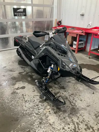 PAYMENTS LOW AS $142 BIWKLY! 2025 POLARIS Switchback Assault Boost 146 2.0. BLACK, VELOCITY SHOCKS,...