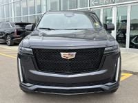 The 2023 Cadillac Escalade Sport Platinum stands out in Galactic Grey Metallic with 22-inch 12-spoke... (image 1)