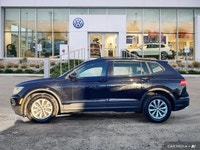 This Volkswagen Tiguan boasts a Intercooled Turbo Regular Unleaded I-4 2.0 L/121 engine powering thi... (image 1)