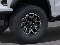 The 2025 Chevrolet Colorado ZR2, presented in Summit White with a Jet Black/Artemis interior, is eng... (image 8)