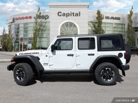This Jeep Wrangler has a strong ERC 3.6L Pentastar(TM) VVT V6 engine w/ESS engine powering this Auto... (image 1)