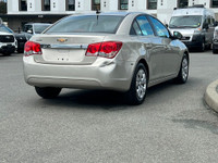 This 2013 Chevrolet Cruze has a Grey exterior and Grey seats with seating for 5. Equipped with a 1.4... (image 7)