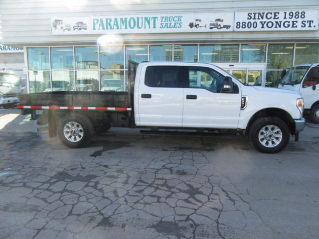  2021 Ford F-350 GAS CREW CAB 4X4 WITH 9 FT FLAT DECK / 2 IN STO in Cars & Trucks in Markham / York Region - Image 2