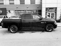 This Ram 1500 has a dependable Regular Unleaded V-8 5.7 L/345 engine powering this Automatic transmi... (image 1)