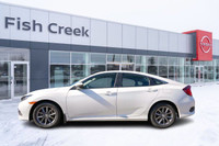 The 2021 Honda Civic EX is a stylish and efficient compact sedan that offers a smooth ride, modern t... (image 2)