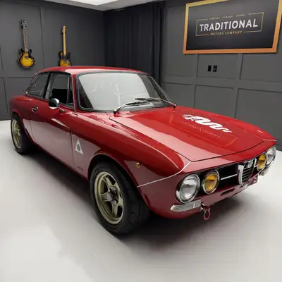 Discover the classic charm of the Alfa Romeo GTV. This iconic vehicle combines vintage style with ex...