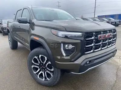 The 2025 GMC Canyon Crew Cab AT4 in Deep Bronze Metallic is designed for those who crave both advent...