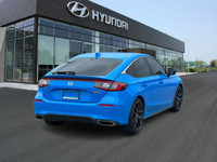 he 2023 Honda Civic Sport Touring Hatchback offers a dynamic blend of performance, style, and advanc... (image 4)