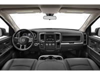 The 2021 Ram 1500 Classic Express 4x4 Crew Cab 57 Box is a bold black truck with an impressive 44 dr... (image 9)