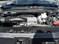 This 2023 Ram 1500 Sport Crew Cab 4x4 boasts a commanding presence with its Bright White exterior an... (image 7)