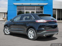 This 2018 Ford Edge SEL boasts a sleek Shadow Black exterior and a sophisticated Ebony interior. Wit... (image 3)