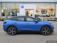 This Volkswagen ID.4 boasts a Electric engine powering this Automatic transmission. Window Grid And... (image 5)
