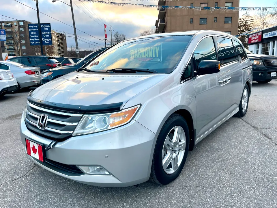 2012 Honda Odyssey TOURING NAVI BT REV CAM HEAT LEATHER 8 SEATS.