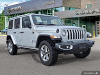 This 2023 Jeep Wrangler Sahara, a head-turner in Silver Zynith, offers both rugged capability and re... (image 6)