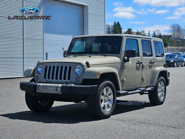 Jeep Wrangler Unlimited Modèle Sahara 4 portes 2 Toits traction  in Cars & Trucks in Victoriaville