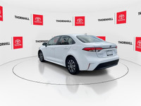 This, is a White 2024 Toyota Corolla Hybrid with LE AWD Package, Featuring:~ Complete Service Histor... (image 6)