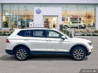 This Volkswagen Tiguan delivers a Intercooled Turbo Regular Unleaded I-4 2.0 L/121 engine powering t... (image 4)