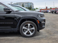 This 2022 Jeep Grand Cherokee 4xe, presented in a menacing and sophisticated *Black* finish, represe... (image 6)