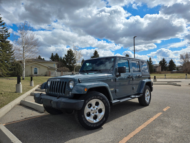 2015 Jeep Wrangler Unlimited Sahara in Cars & Trucks in Calgary
