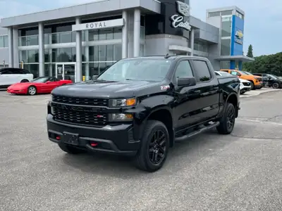 The 2022 Chevrolet Silverado 1500 LTD Custom Trail Boss in an adventurous black finish, powers throu...