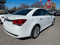..CHEVROLET CRUZE LTZ RS BT PARK ASSIST ALLOYS SUNROOF HEAT LEATHER…..PERFECT. ……….....WE INCLUDE EV... (image 4)