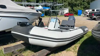 Take on the water with the 2023 Zodiac Open 3.4, a durable and compact rigid inflatable boat designe...