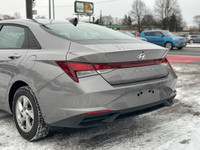 The 2023 Hyundai Elantra is a modern and stylish compact sedan that stands out with its bold design... (image 8)