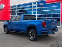 Recent Arrival! Check out this gorgeous Dynamic Blue 2022 GMC Sierra AT4!! This truck is stunning in... (image 4)
