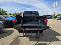 This brand new ANTIMATTER BLUE METALLIC 2025 FORD F-150 LIGHTNING LARIAT is powered by an ELECTRIC E... (image 9)