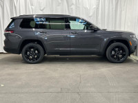 The 2025 Jeep Grand Cherokee L Limited 4x4 in sophisticated gray with its smooth 4x4 drivetrain prom... (image 5)