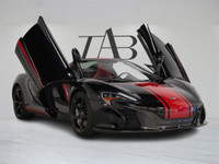 This clean Carfax, Ontario 2015 McLaren 650S Spider is a thrilling low-kilometre supercar finished i... (image 1)
