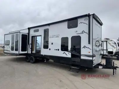 Forest River Timberwolf Black Label destination trailer 39DLBL highlights: Kitchen Island Dual Entry...