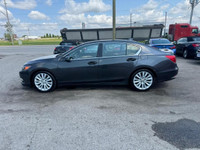 TIGER AUTO SALES LTD - Quality Pre-Owned Car Dealership - Located at 2275 Dundas St., London, Ontari... (image 1)
